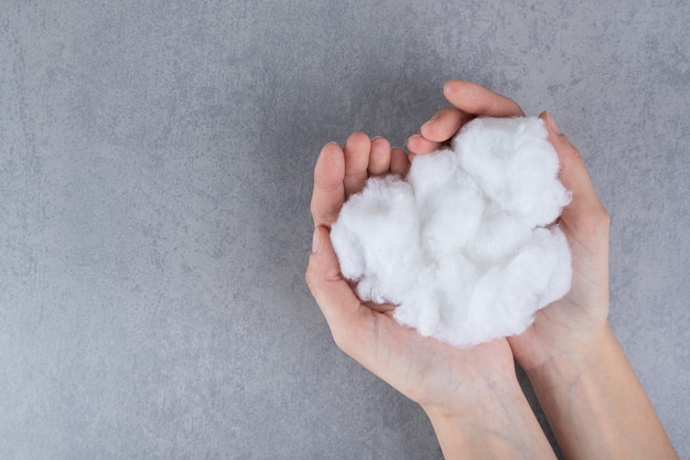 Medical soft cotton wool on a gray surface