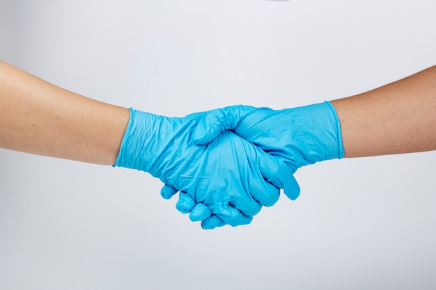 Medical staff shaking hands during coronavirus pandemic