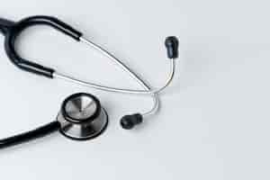 Free photo medical stethoscope on a white surface