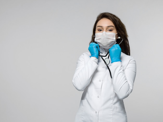 Medical worker using a stethoscope