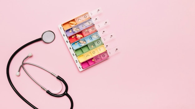 Medication organizer near stethoscope