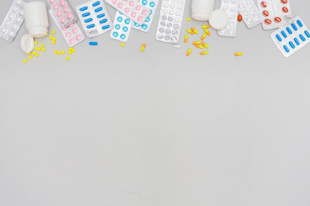 Free photo medicine concept with pills and copyspace on bottom