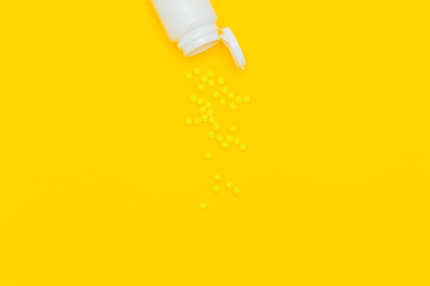 Medicine concept with pills and copyspace on bottom