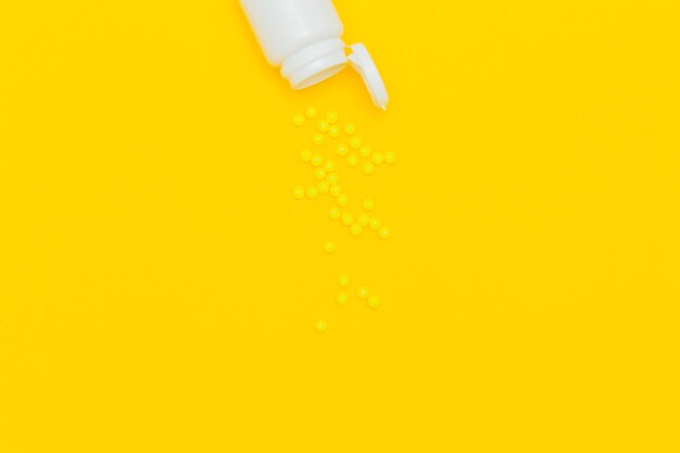 Medicine concept with pills and copyspace on bottom