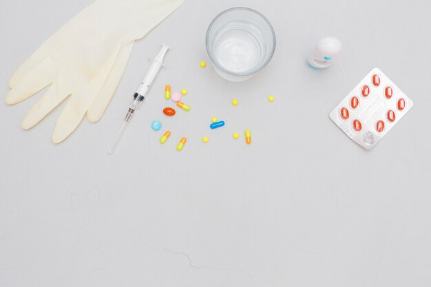 Medicine concept with pills and medical equipment