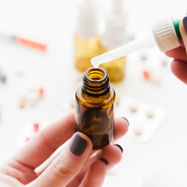medicine dropper and glass container