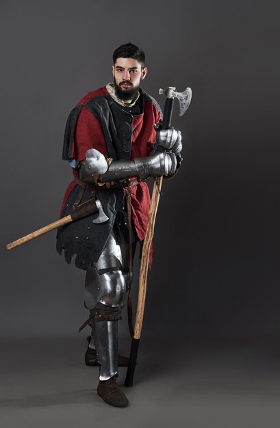 Medieval knight on grey