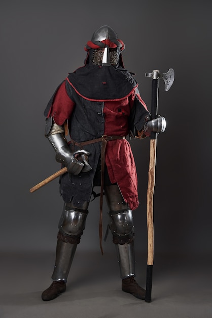Medieval knight on grey