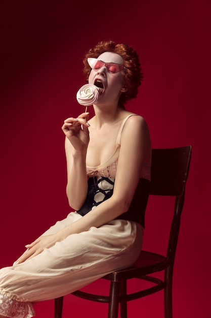 Get Captivating Images of a Medieval Redhead Duchess in Black Corset and Night Clothes