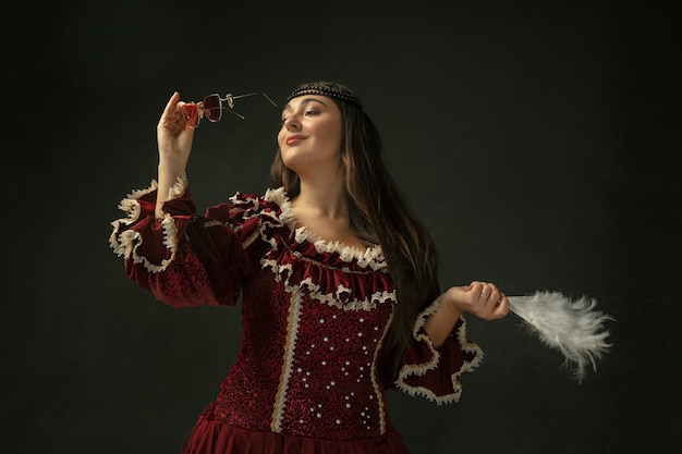 Medieval young woman in oldfashioned costume