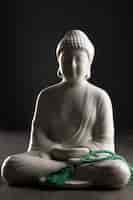 Free photo meditation and tranquility with buddha statuette