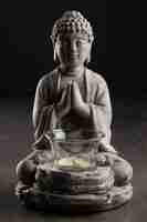 Free photo meditation and tranquility with buddha statuette