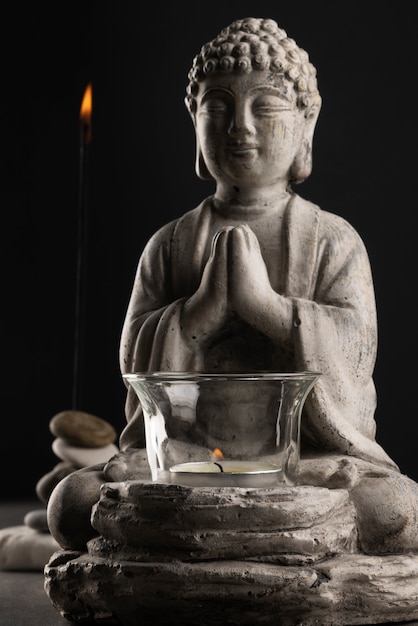 Free photo meditation and tranquility with buddha statuette