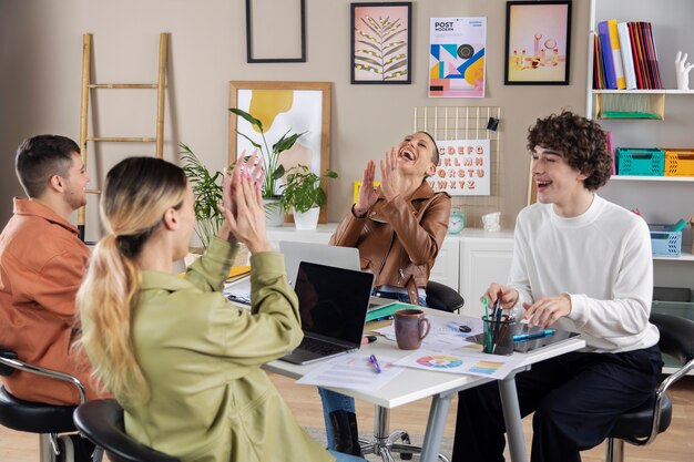 medium colleagues applauding