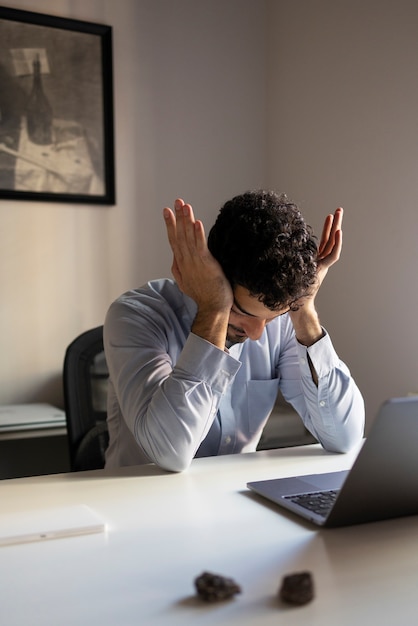 Medium shot anxious man indoors