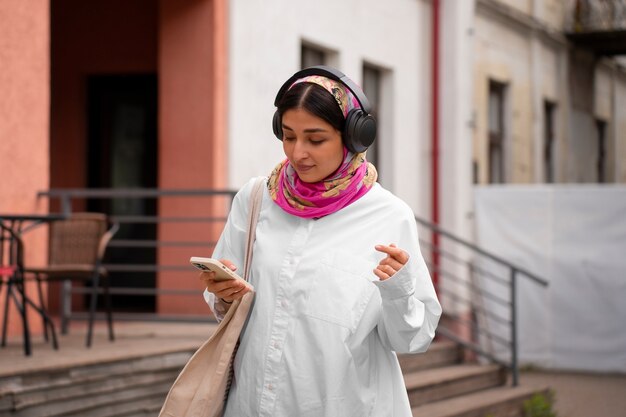 Medium shot arab woman wearing hijab