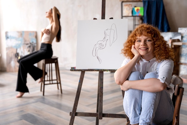 Medium shot artists at workshop