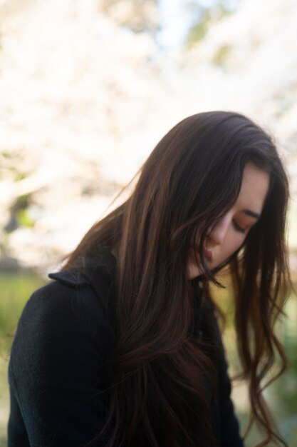 Medium shot asian woman posing in nature