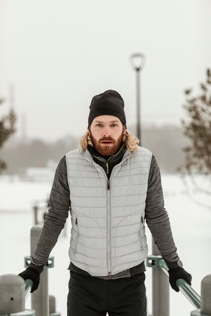 Medium shot athlete posing outdoors