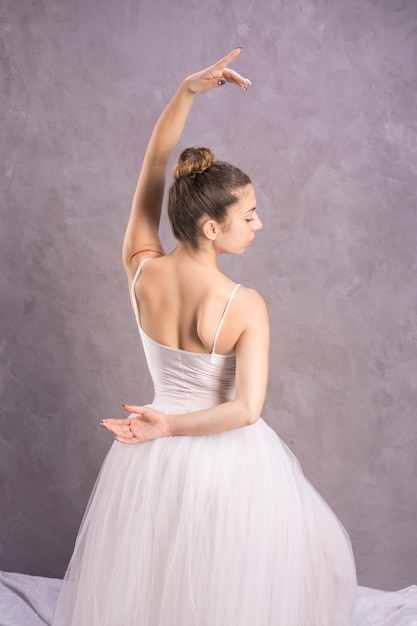 Medium shot back view ballerina