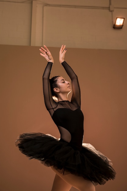 Medium shot ballerina swan posture