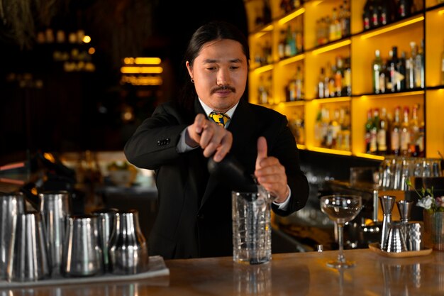 Medium shot bartender preparing drink