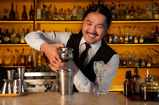 Medium shot bartender preparing drink