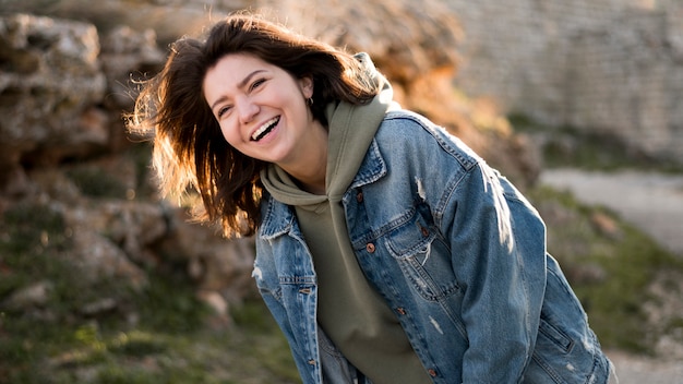 Medium shot of beautiful smiley woman