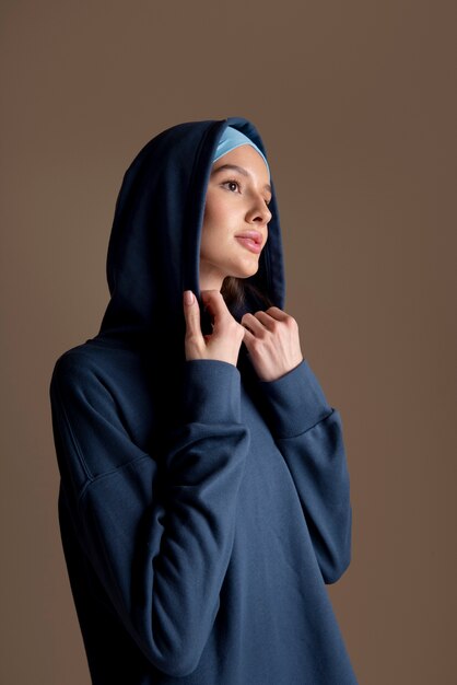 Medium shot beautiful woman wearing hijab