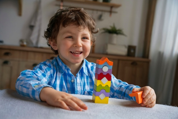 Medium shot boy playing memory game