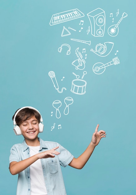 Medium shot boy wearing headphones