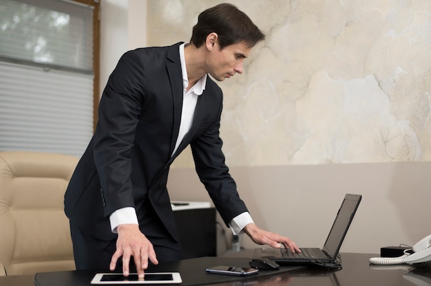 Medium shot of businessman working