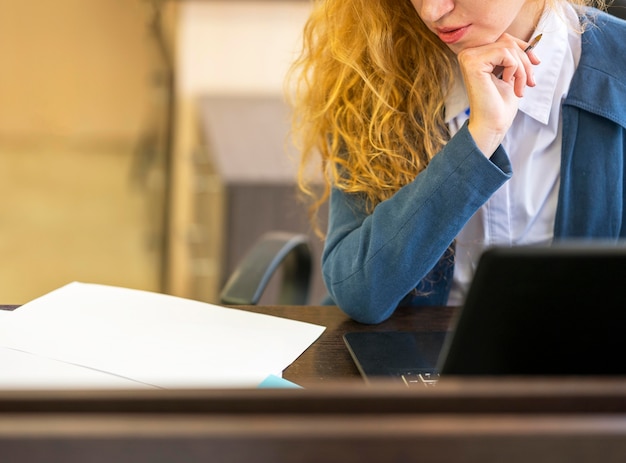 Medium shot businesswoman reading