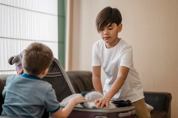 Medium shot children packing