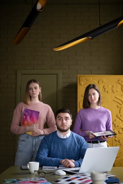 medium shot colleagues standing together