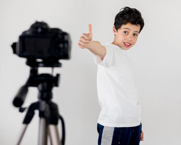 medium shot cool kid showing approval