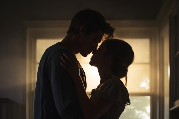 medium shot couple being romantic