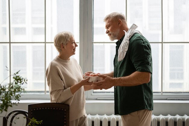 Medium shot couple celebrating orthodox easter