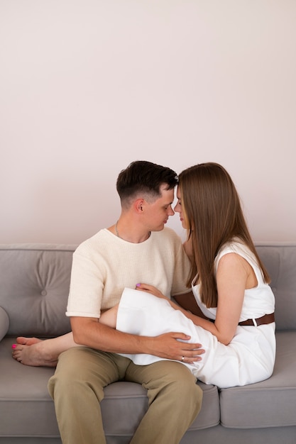 Medium shot couple on couch