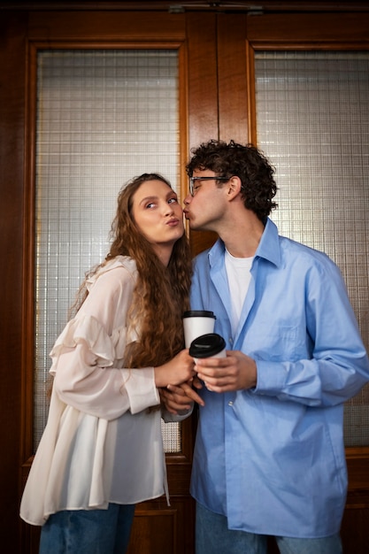 Free photo medium shot couple having a bookstore date