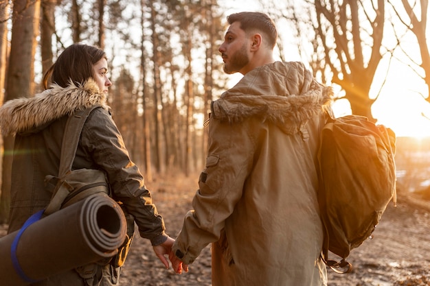 Medium shot couple holding hands