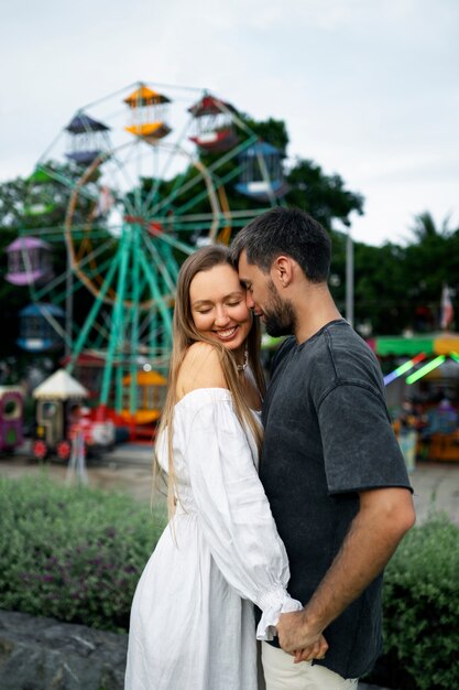 Medium shot couple holding hands