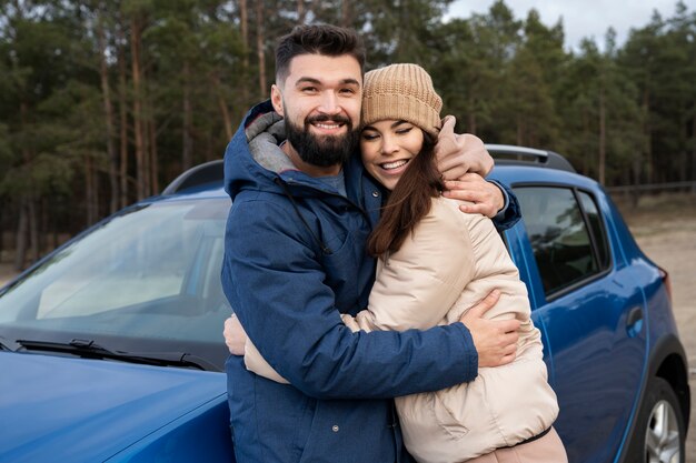 medium shot couple hugging
