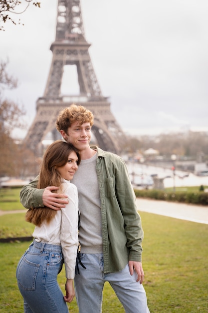 Free photo medium shot couple posing together