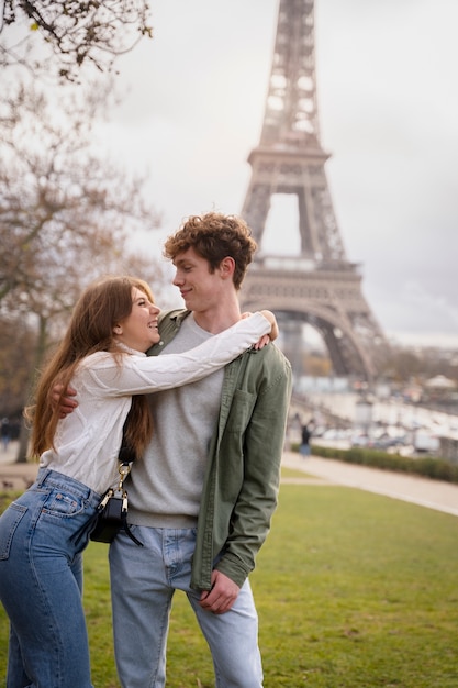 Free photo medium shot couple posing together