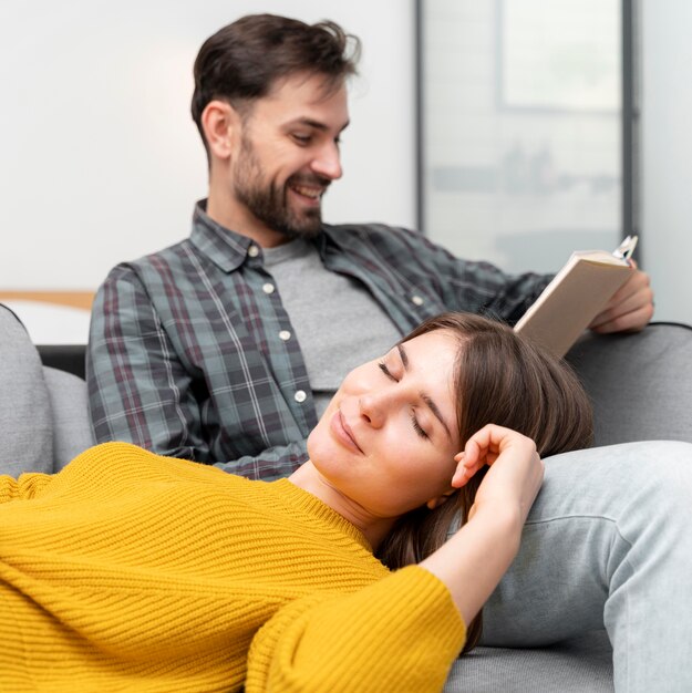 Medium shot couple relaxing together