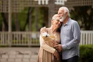 Free photo medium shot couple standing together