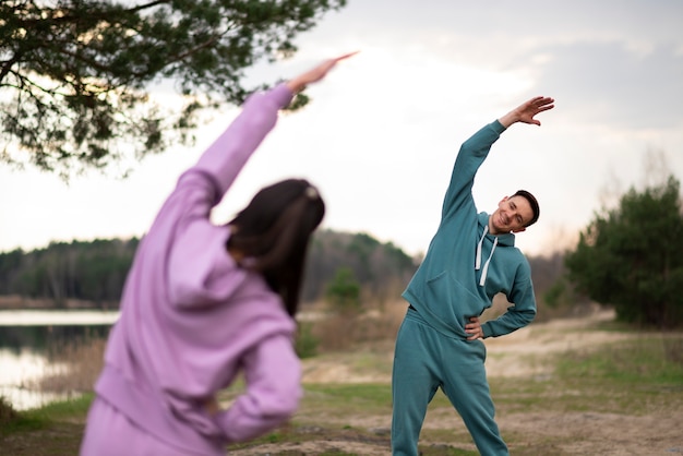 Free photo medium shot couple training together