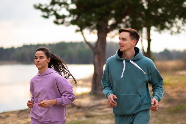 Medium shot couple training together