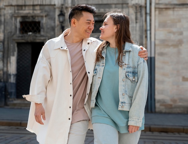 medium shot couple walking together